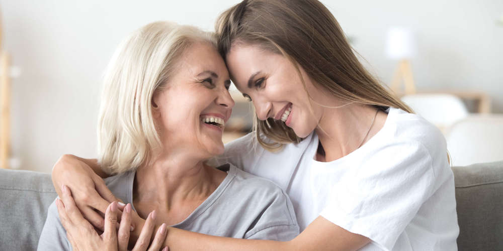 mother and daughter hugging