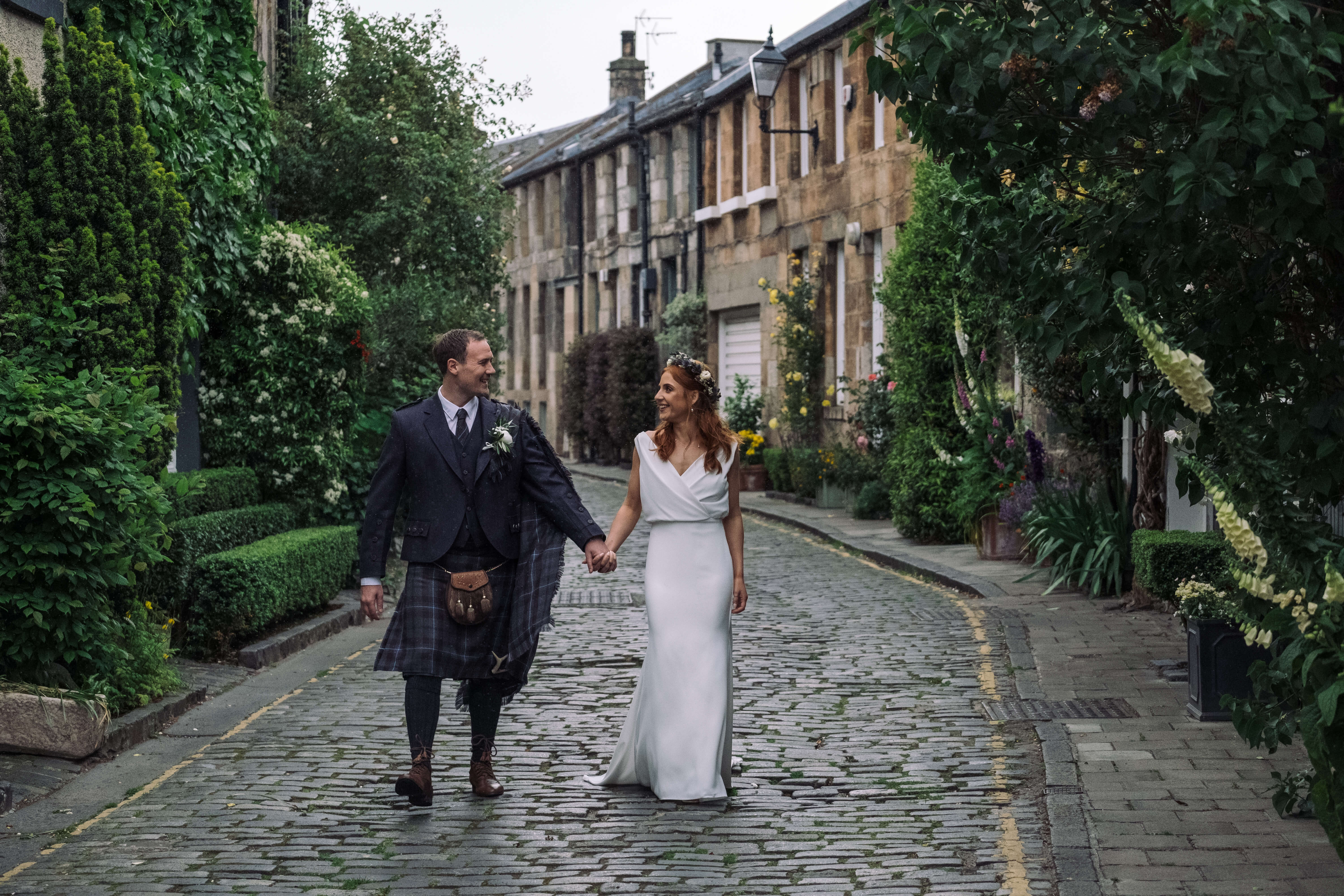 Bride and Groom walking hand in hand