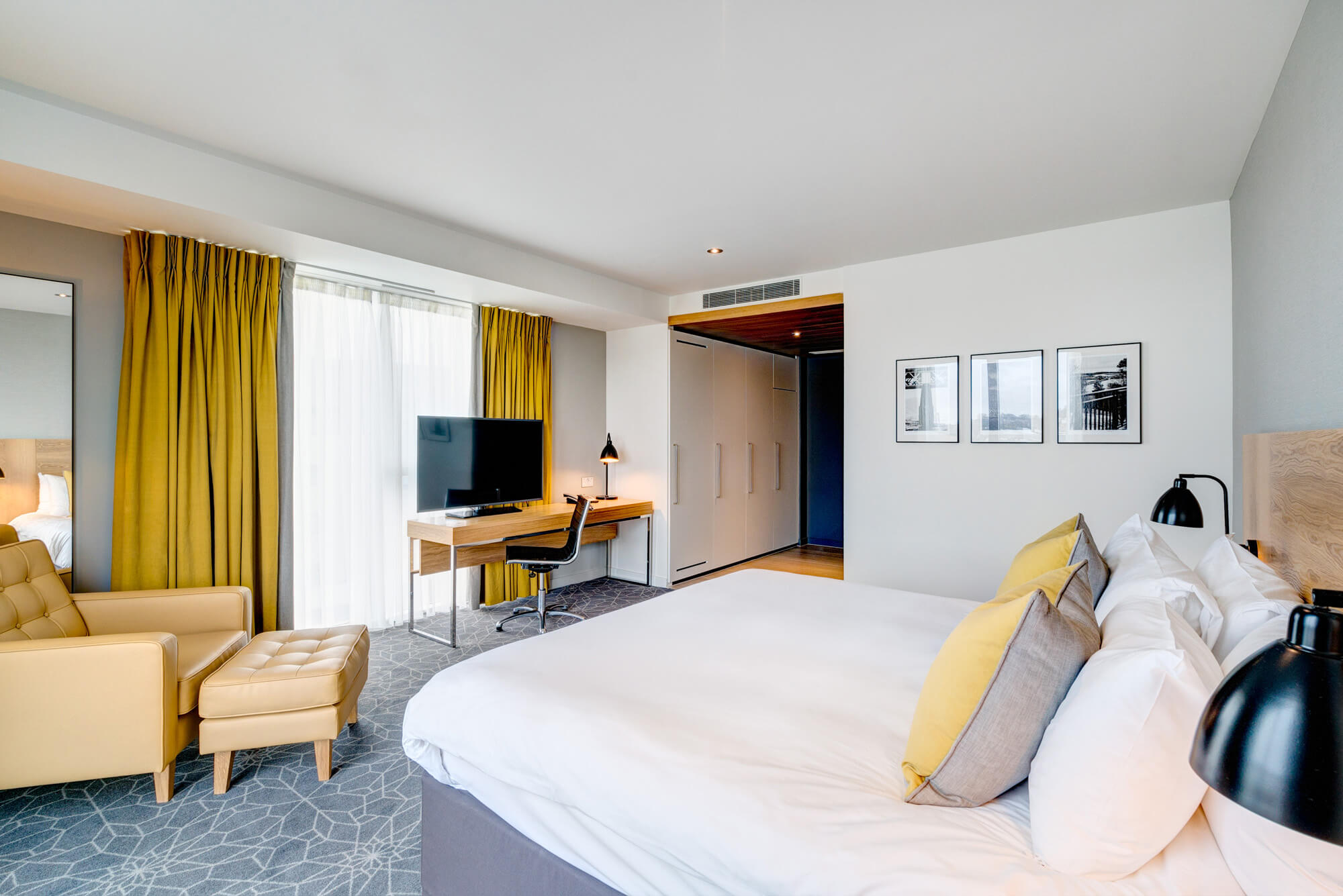 Bed and window seating area in Superior room