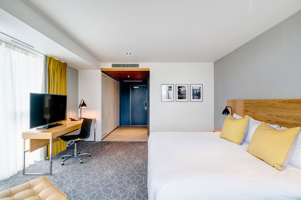Superior Room with double bed and floor-to-ceiling windows at Apex City Quay Hotel & Spa Superior Room with double bed and floor-to-ceiling windows at Apex City Quay Hotel & Spa