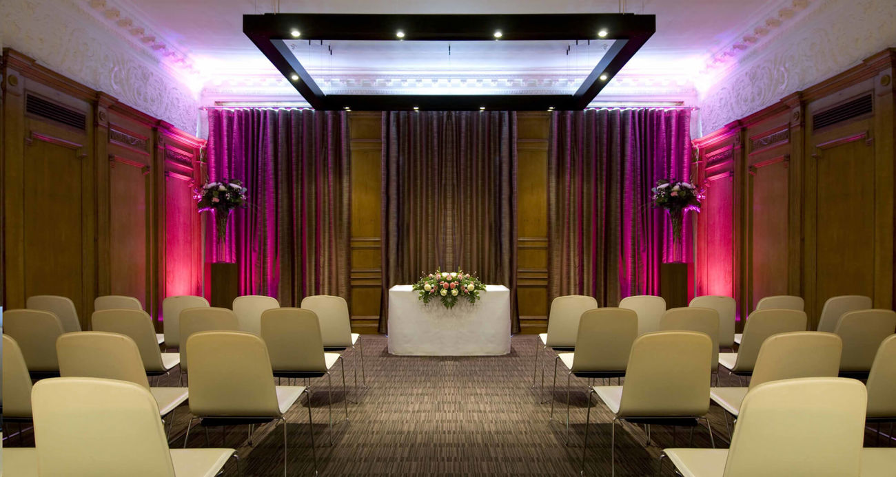 Forth room at Apex Waterloo Place Hotel set up for wedding ceremony with altar, aisle and chairs