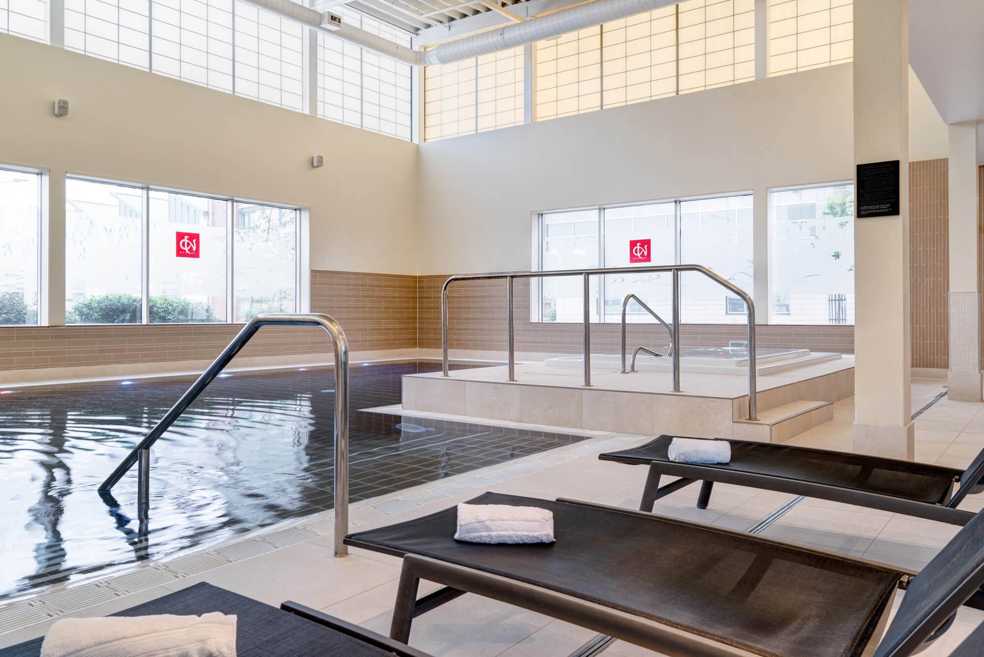 Yu Spa swimming pool with poolside loungers